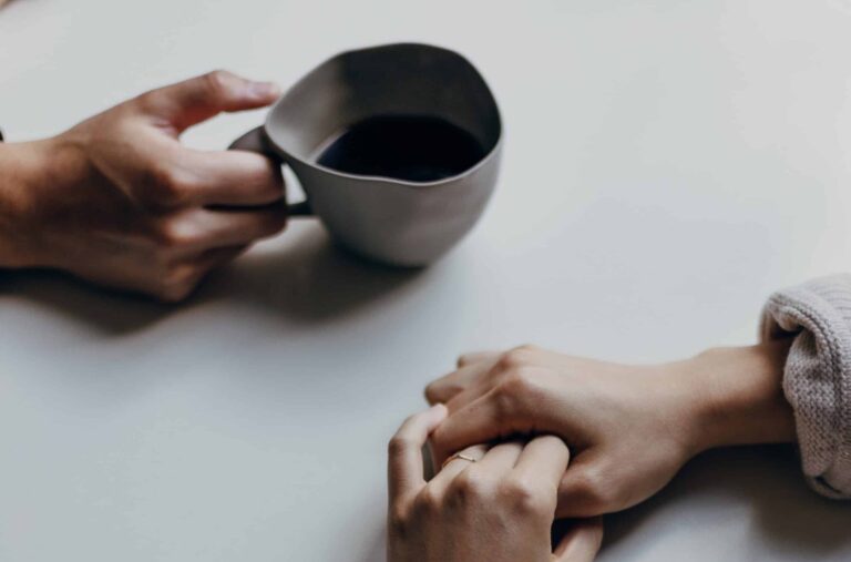 hands and coffee