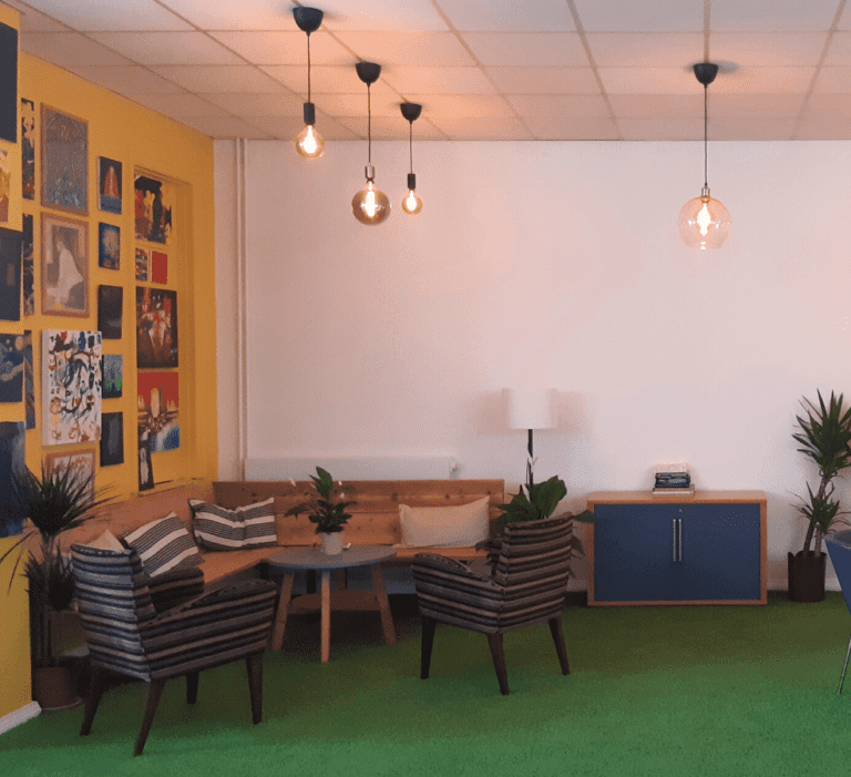 Picture of the crisis cafe reception area with chairs and table