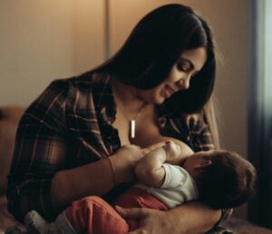 mother feeding her baby