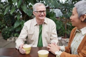 man and woman talking outside